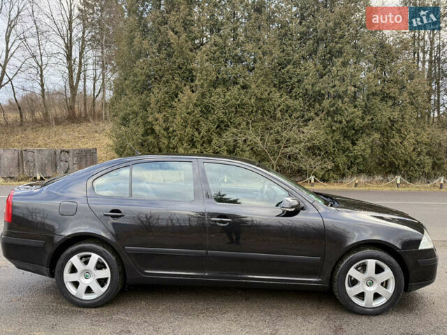 Черный Шкода Октавия, объемом двигателя 1.6 л и пробегом 210 тыс. км за 5450 $, фото 54 на Automoto.ua