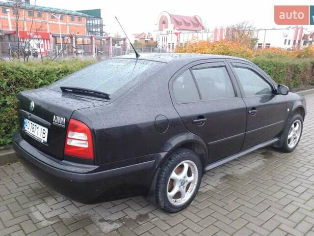 Черный Шкода Октавия, объемом двигателя 1.6 л и пробегом 180 тыс. км за 5250 $, фото 5 на Automoto.ua