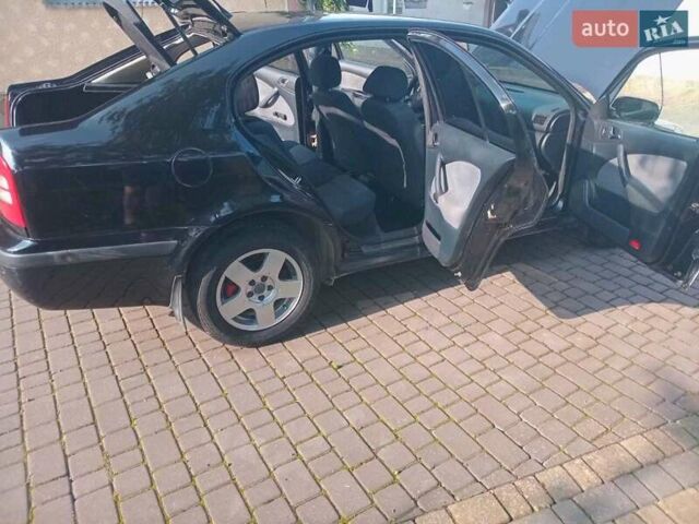 Черный Шкода Октавия, объемом двигателя 1.9 л и пробегом 330 тыс. км за 5200 $, фото 11 на Automoto.ua