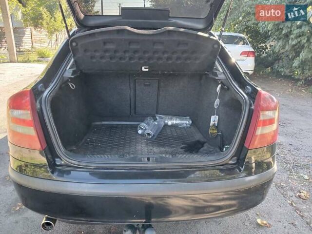 Черный Шкода Октавия, объемом двигателя 1.6 л и пробегом 288 тыс. км за 4700 $, фото 11 на Automoto.ua