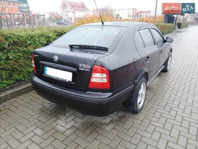 Черный Шкода Октавия, объемом двигателя 1.6 л и пробегом 180 тыс. км за 5200 $, фото 6 на Automoto.ua