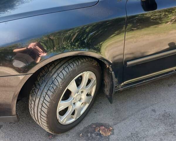 Черный Шкода Октавия, объемом двигателя 1.6 л и пробегом 288 тыс. км за 4700 $, фото 3 на Automoto.ua