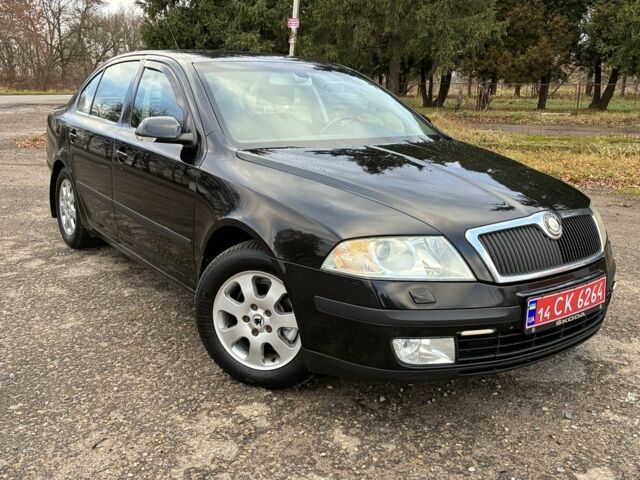 Черный Шкода Октавия, объемом двигателя 1.6 л и пробегом 180 тыс. км за 5750 $, фото 4 на Automoto.ua