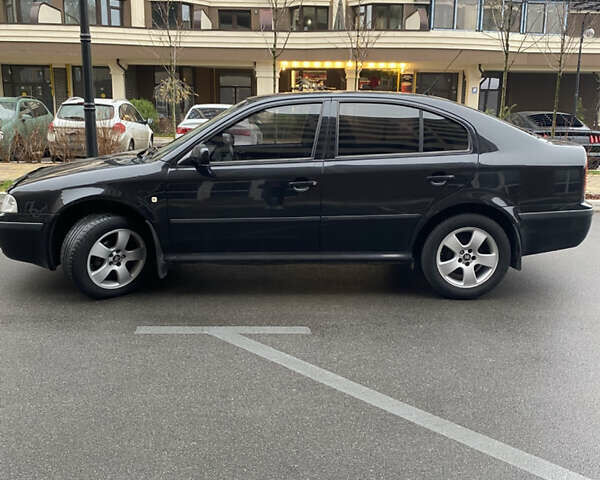 Черный Шкода Октавия, объемом двигателя 1.6 л и пробегом 359 тыс. км за 5100 $, фото 2 на Automoto.ua