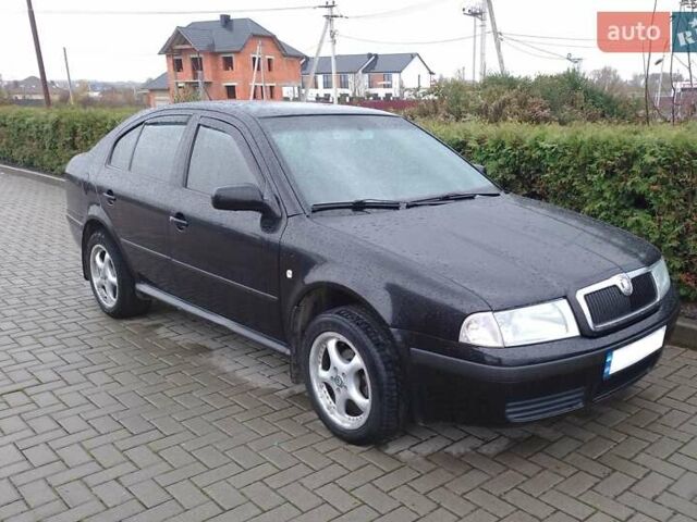 Черный Шкода Октавия, объемом двигателя 1.6 л и пробегом 180 тыс. км за 5200 $, фото 1 на Automoto.ua