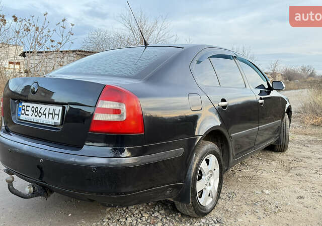 Черный Шкода Октавия, объемом двигателя 1.6 л и пробегом 287 тыс. км за 5600 $, фото 3 на Automoto.ua