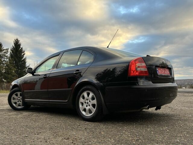 Черный Шкода Октавия, объемом двигателя 1.6 л и пробегом 180 тыс. км за 5750 $, фото 6 на Automoto.ua