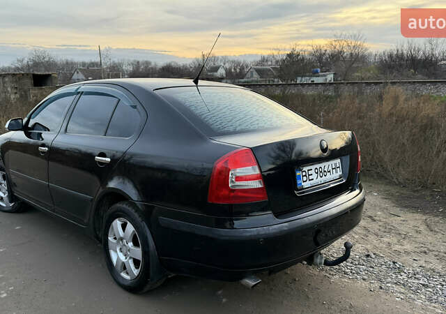 Черный Шкода Октавия, объемом двигателя 1.6 л и пробегом 287 тыс. км за 5600 $, фото 2 на Automoto.ua