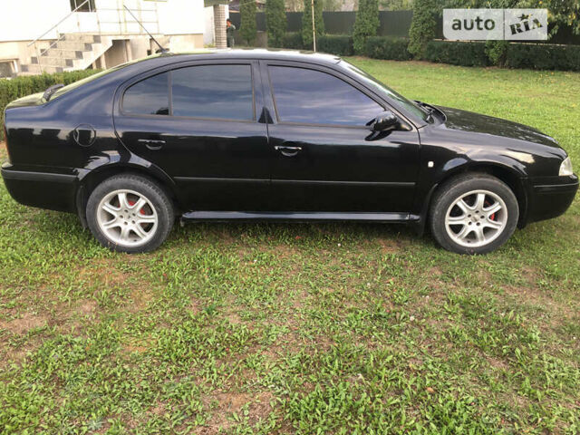Черный Шкода Октавия, объемом двигателя 1.6 л и пробегом 165 тыс. км за 4700 $, фото 8 на Automoto.ua