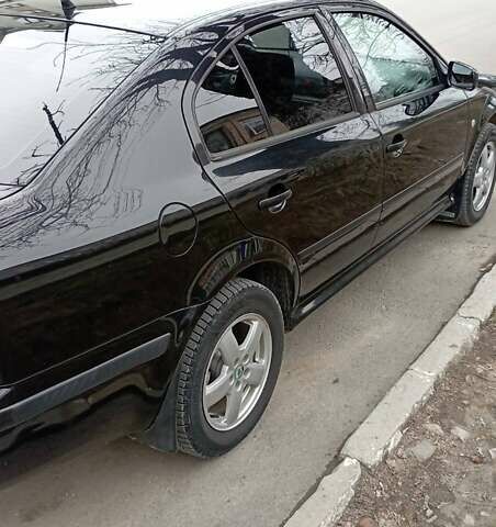 Черный Шкода Октавия, объемом двигателя 1.78 л и пробегом 299 тыс. км за 4200 $, фото 4 на Automoto.ua