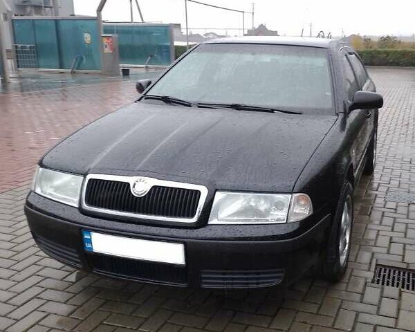 Черный Шкода Октавия, объемом двигателя 1.6 л и пробегом 180 тыс. км за 5250 $, фото 1 на Automoto.ua