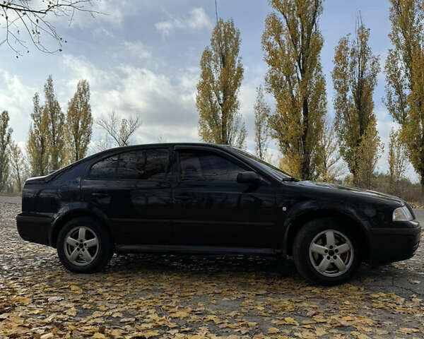 Шкода Октавія 2005 у Дніпро (Дніпропетровську) на Automoto.ua Чорний Шкода Октавія, об'ємом двигуна 1.8 л та пробігом 241 тис. км за 3450 $, фото 4 на Automoto.ua