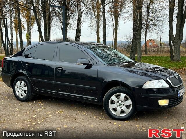 Черный Шкода Октавия, объемом двигателя 1.6 л и пробегом 256 тыс. км за 5800 $, фото 6 на Automoto.ua