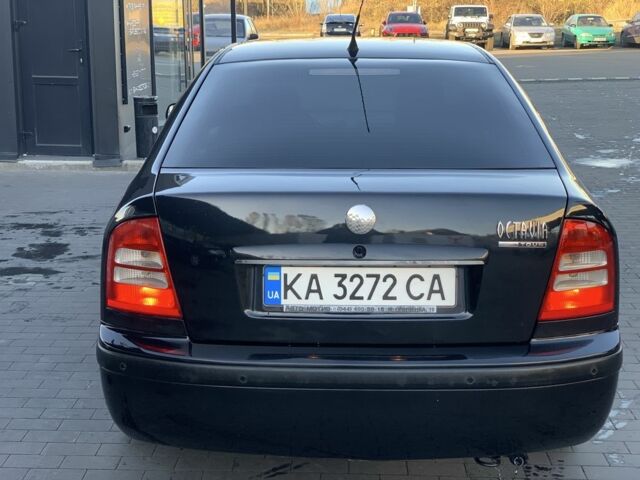 Черный Шкода Октавия, объемом двигателя 1.6 л и пробегом 358 тыс. км за 4300 $, фото 3 на Automoto.ua