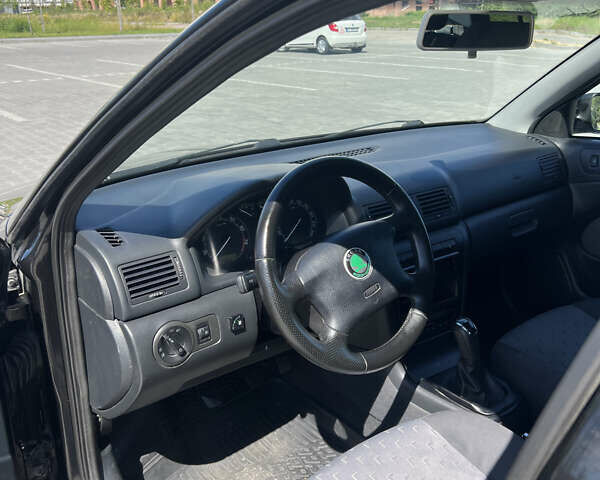 Чорний Шкода Октавія, об'ємом двигуна 1.8 л та пробігом 291 тис. км за 5300 $, фото 13 на Automoto.ua