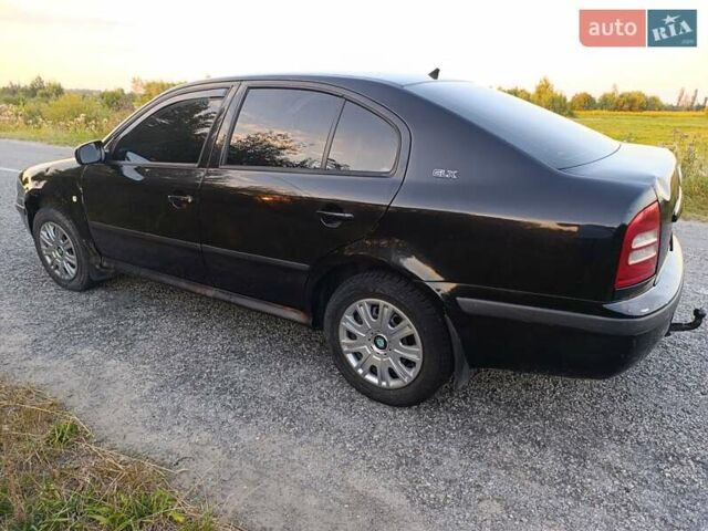 Черный Шкода Октавия, объемом двигателя 1.6 л и пробегом 352 тыс. км за 3400 $, фото 8 на Automoto.ua