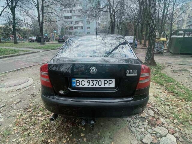 Черный Шкода Октавия, объемом двигателя 1.6 л и пробегом 215 тыс. км за 5500 $, фото 1 на Automoto.ua