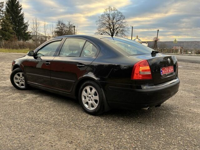 Черный Шкода Октавия, объемом двигателя 1.6 л и пробегом 180 тыс. км за 5750 $, фото 7 на Automoto.ua