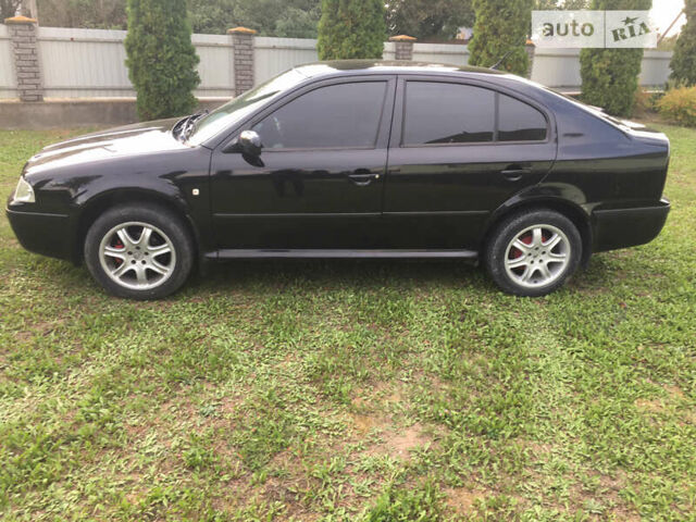 Черный Шкода Октавия, объемом двигателя 1.6 л и пробегом 165 тыс. км за 4700 $, фото 7 на Automoto.ua