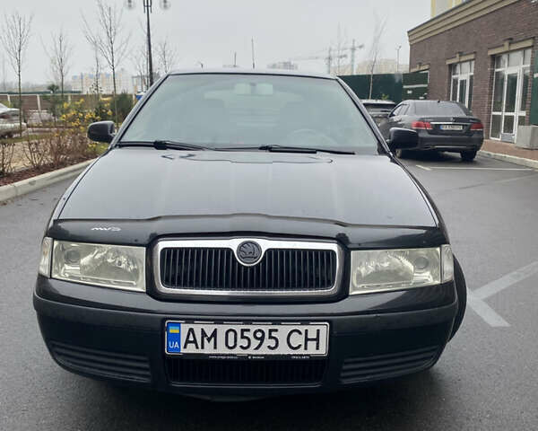 Черный Шкода Октавия, объемом двигателя 1.6 л и пробегом 359 тыс. км за 5100 $, фото 1 на Automoto.ua