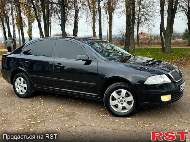 Черный Шкода Октавия, объемом двигателя 1.6 л и пробегом 256 тыс. км за 5800 $, фото 7 на Automoto.ua