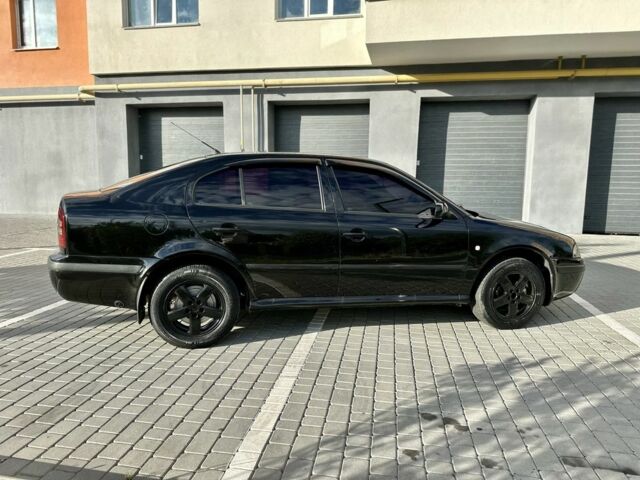 Черный Шкода Октавия, объемом двигателя 1.6 л и пробегом 300 тыс. км за 4700 $, фото 6 на Automoto.ua