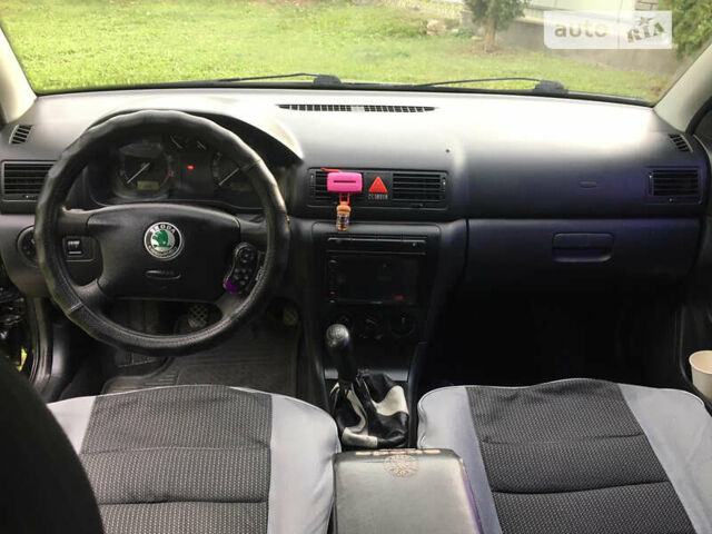 Черный Шкода Октавия, объемом двигателя 1.6 л и пробегом 165 тыс. км за 4700 $, фото 10 на Automoto.ua