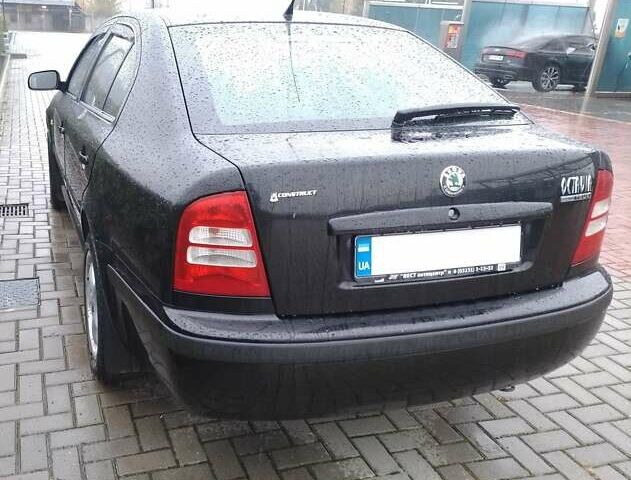 Черный Шкода Октавия, объемом двигателя 1.6 л и пробегом 180 тыс. км за 5200 $, фото 4 на Automoto.ua