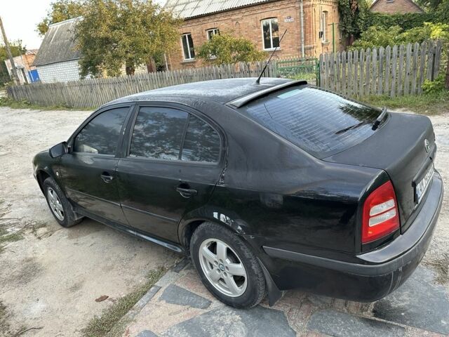 Черный Шкода Октавия, объемом двигателя 1.6 л и пробегом 210 тыс. км за 5200 $, фото 6 на Automoto.ua