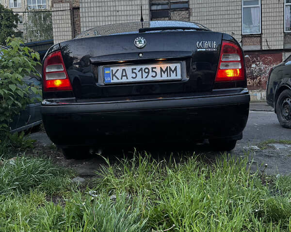 Черный Шкода Октавия, объемом двигателя 1.6 л и пробегом 250 тыс. км за 5200 $, фото 7 на Automoto.ua