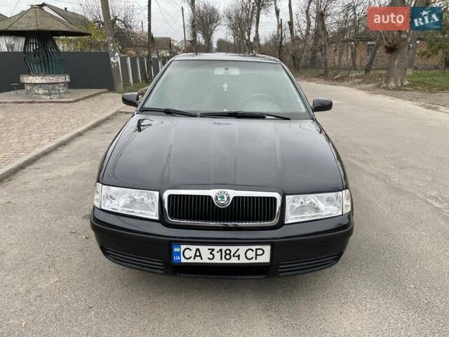 Черный Шкода Октавия, объемом двигателя 1.6 л и пробегом 292 тыс. км за 5250 $, фото 7 на Automoto.ua