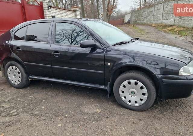 Черный Шкода Октавия, объемом двигателя 1.6 л и пробегом 268 тыс. км за 6500 $, фото 2 на Automoto.ua