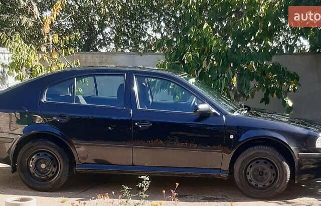 Черный Шкода Октавия, объемом двигателя 1.6 л и пробегом 170 тыс. км за 5200 $, фото 2 на Automoto.ua