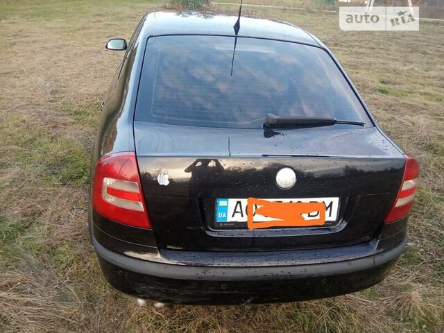 Черный Шкода Октавия, объемом двигателя 2 л и пробегом 283 тыс. км за 5500 $, фото 2 на Automoto.ua