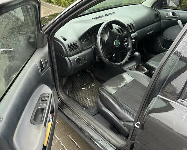 Черный Шкода Октавия, объемом двигателя 1.9 л и пробегом 302 тыс. км за 5950 $, фото 12 на Automoto.ua