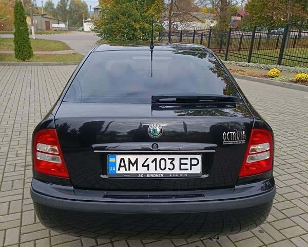 Черный Шкода Октавия, объемом двигателя 1.6 л и пробегом 300 тыс. км за 4600 $, фото 13 на Automoto.ua