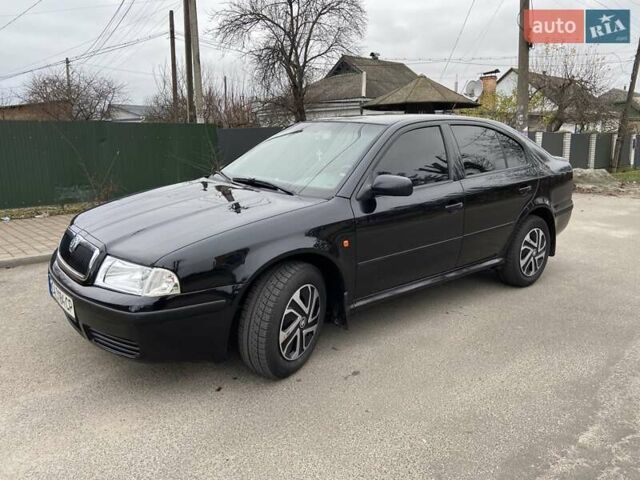 Черный Шкода Октавия, объемом двигателя 1.6 л и пробегом 292 тыс. км за 5250 $, фото 1 на Automoto.ua