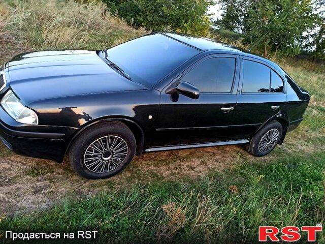 Черный Шкода Октавия, объемом двигателя 1.6 л и пробегом 190 тыс. км за 4700 $, фото 1 на Automoto.ua