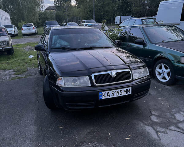 Черный Шкода Октавия, объемом двигателя 1.6 л и пробегом 250 тыс. км за 5200 $, фото 2 на Automoto.ua