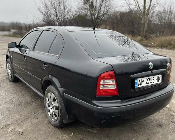 Черный Шкода Октавия, объемом двигателя 1.6 л и пробегом 204 тыс. км за 4100 $, фото 2 на Automoto.ua