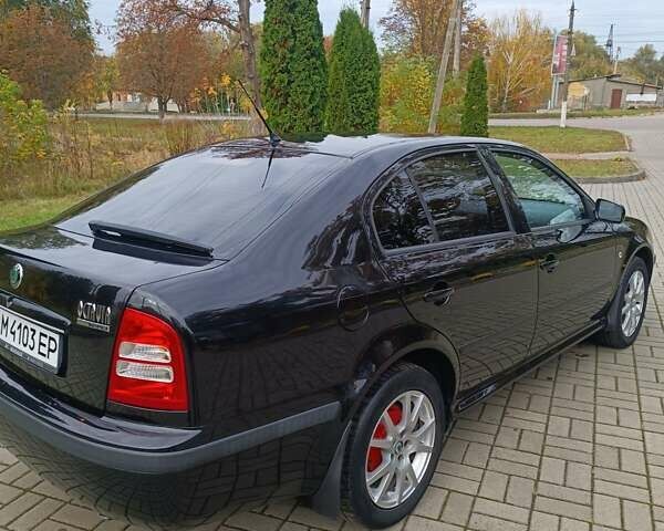 Черный Шкода Октавия, объемом двигателя 1.6 л и пробегом 300 тыс. км за 4600 $, фото 10 на Automoto.ua