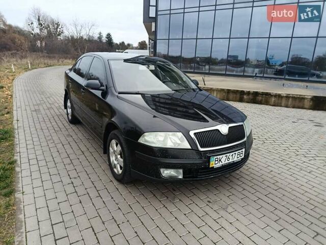 Черный Шкода Октавия, объемом двигателя 2 л и пробегом 240 тыс. км за 3500 $, фото 2 на Automoto.ua