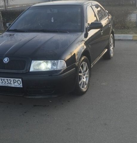 Черный Шкода Октавия, объемом двигателя 1.8 л и пробегом 270 тыс. км за 5400 $, фото 3 на Automoto.ua