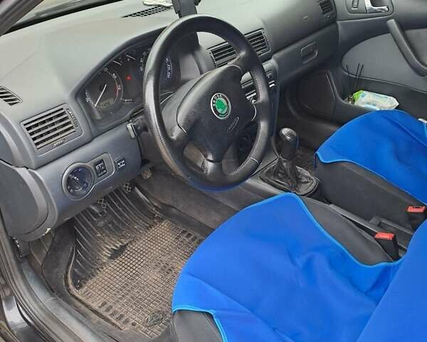 Черный Шкода Октавия, объемом двигателя 1.6 л и пробегом 260 тыс. км за 6500 $, фото 2 на Automoto.ua