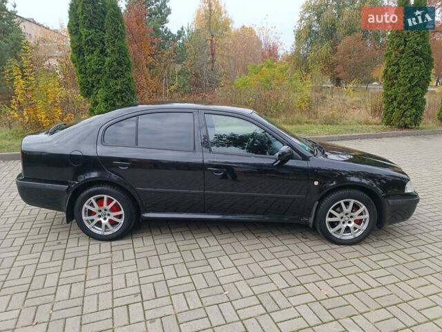 Черный Шкода Октавия, объемом двигателя 1.6 л и пробегом 300 тыс. км за 4600 $, фото 12 на Automoto.ua