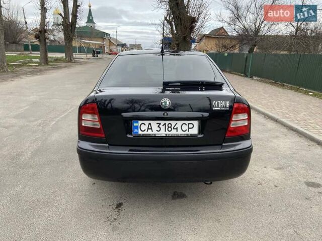 Черный Шкода Октавия, объемом двигателя 1.6 л и пробегом 292 тыс. км за 5250 $, фото 4 на Automoto.ua