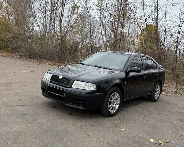 Черный Шкода Октавия, объемом двигателя 1.8 л и пробегом 297 тыс. км за 6500 $, фото 6 на Automoto.ua