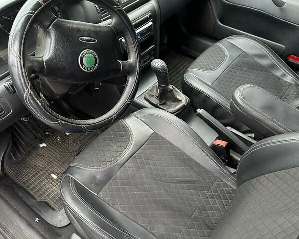 Черный Шкода Октавия, объемом двигателя 1.9 л и пробегом 302 тыс. км за 5950 $, фото 13 на Automoto.ua