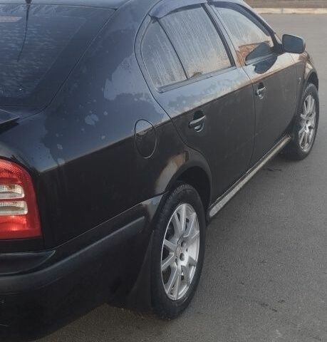 Черный Шкода Октавия, объемом двигателя 1.8 л и пробегом 270 тыс. км за 5400 $, фото 2 на Automoto.ua