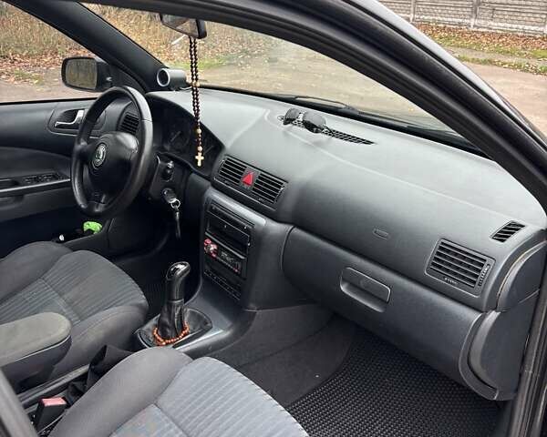 Черный Шкода Октавия, объемом двигателя 1.8 л и пробегом 297 тыс. км за 6500 $, фото 9 на Automoto.ua